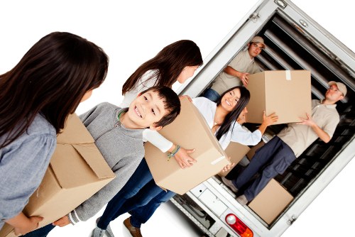 Home moving service in Ruislip with packed boxes and a removal van