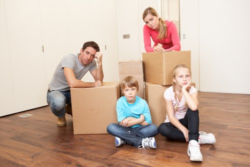 Sorted household items and cardboard prepared for recycling in Ruislip