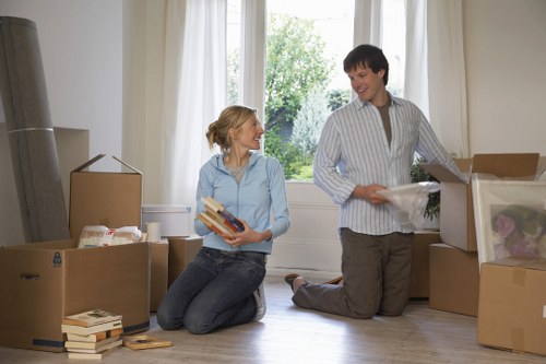 Careful unloading of furniture at a Ruislip home by a removals team