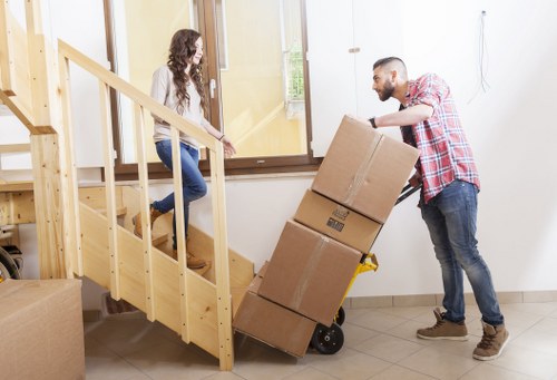 A removals team handling office access and loading in Ruislip