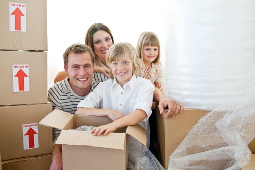 Professional movers handling fragile items during a Ruislip move