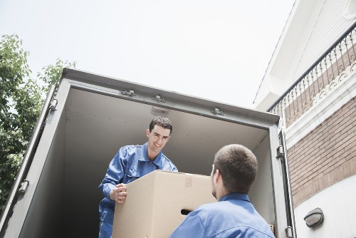 Workers loading unwanted furniture during a Ruislip collection