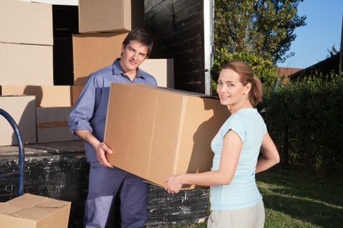 Packed office boxes and furniture ready for relocation in Ruislip